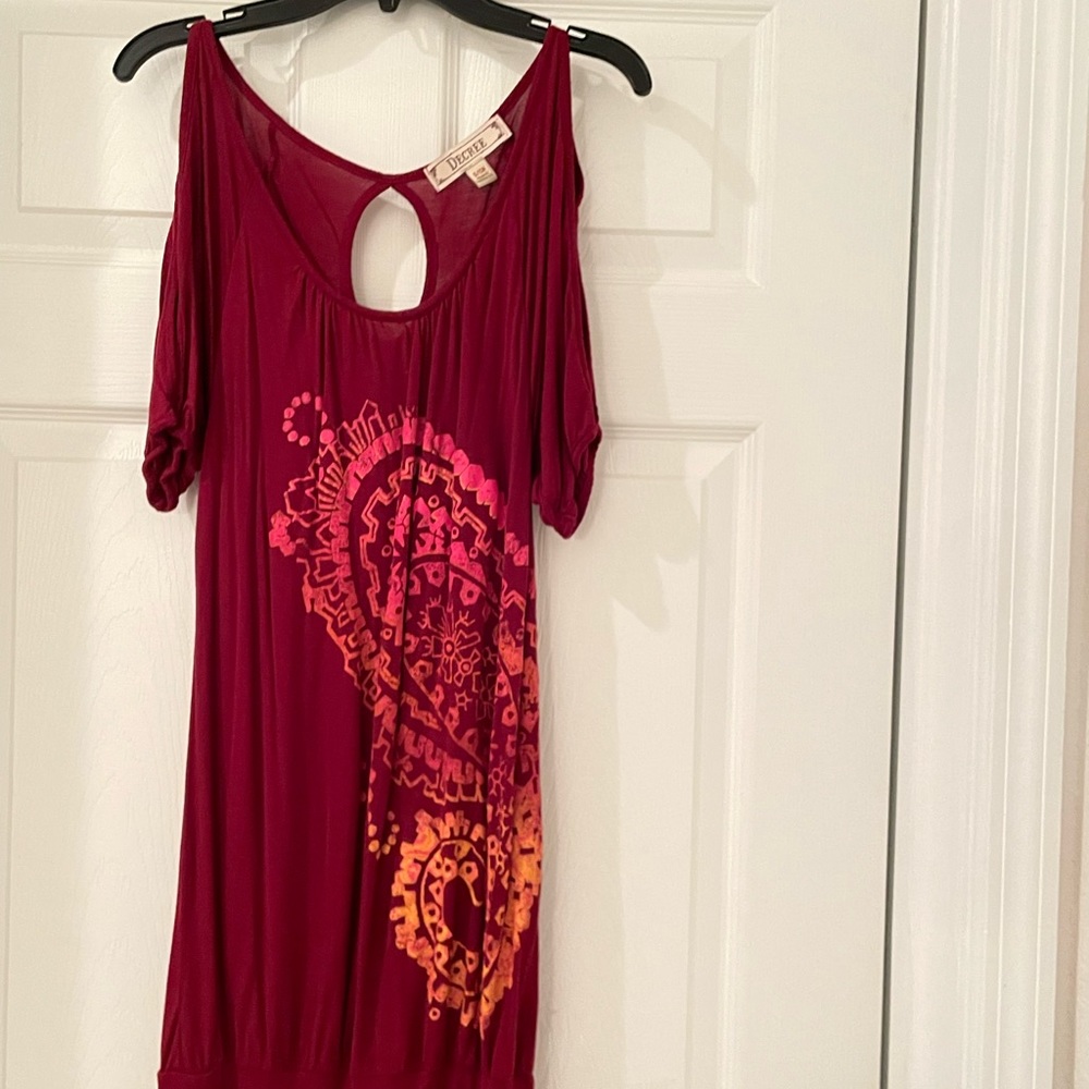 This is a burgundy Decree Dress is great for date night or girls night out